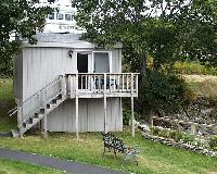 Pilot House - Harborside.  Queen bed with bath, porch. Refrigerator, microwave.