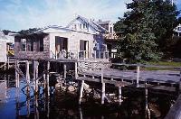Wharf Porch - Dockside. Queen and twin beds with bath, porch. Living room, refrigerator, microwave.